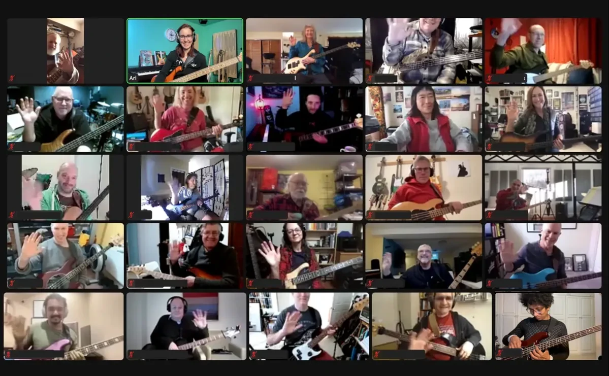 Ari and a room full of bass players practicing together in an online live session